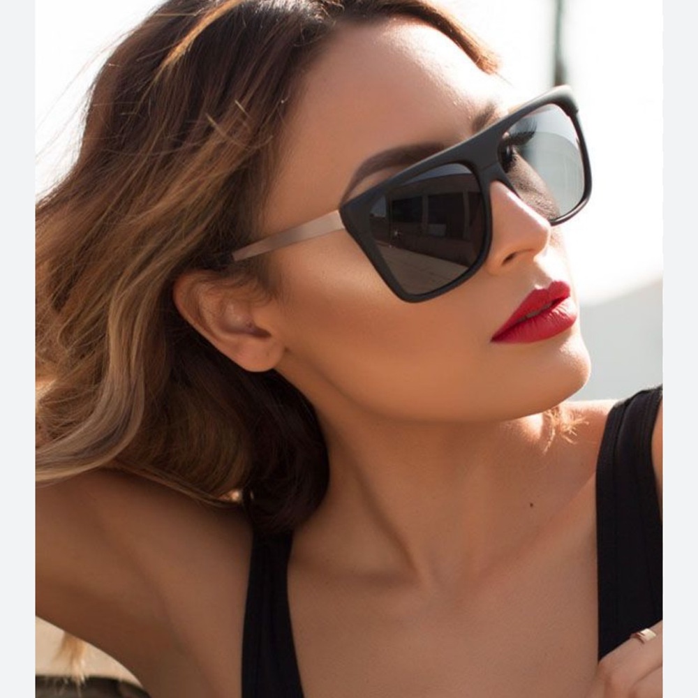 Quay x Desi Perkins on the low sunglasses